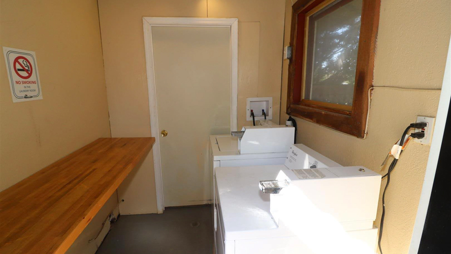 Laundry room is located in the main bathhouse.